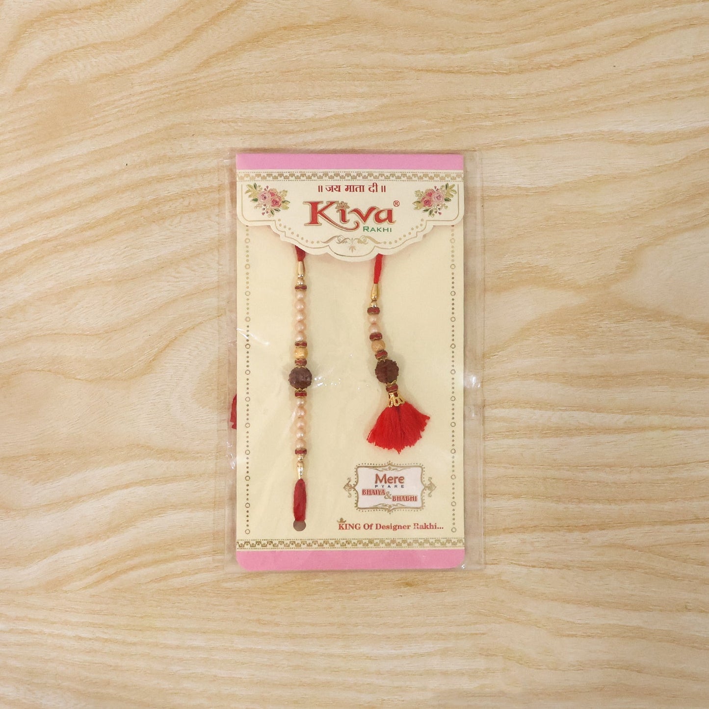 Red tassel latkan on brown bead bhabhi rakhi detail
