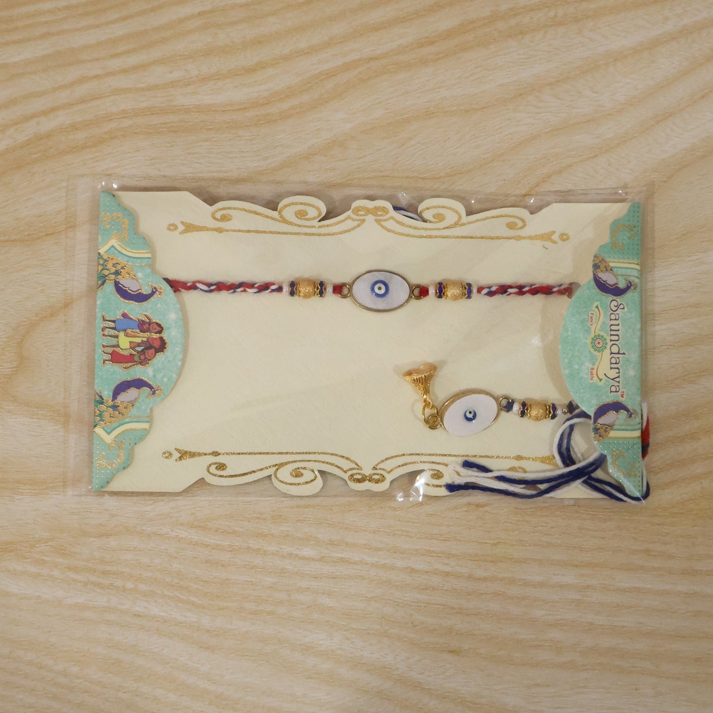 Evil Eye Bhabhi Rakhi displayed on traditional background