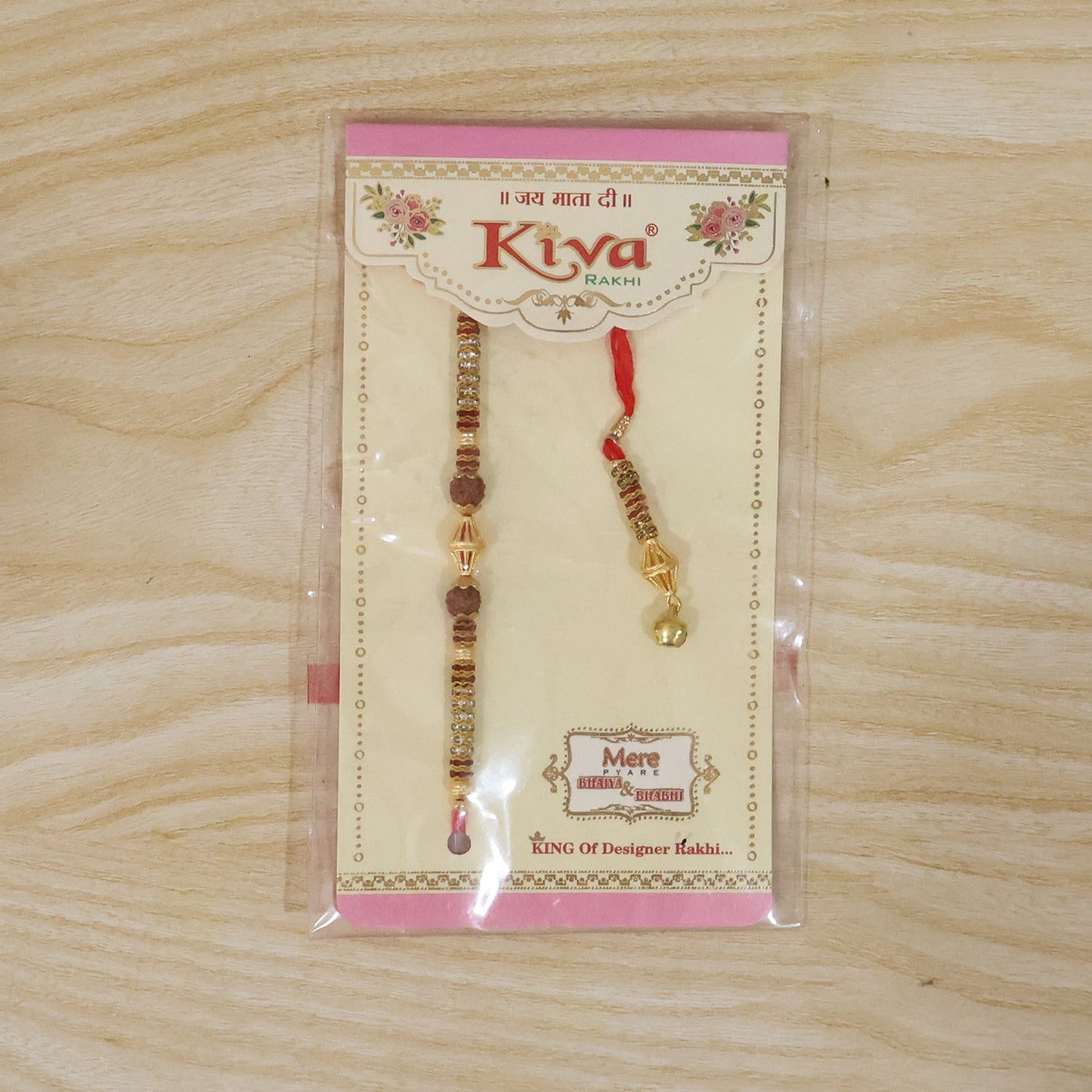Detailed shot of gold latkan on pearl bead Bhabhi Rakhi