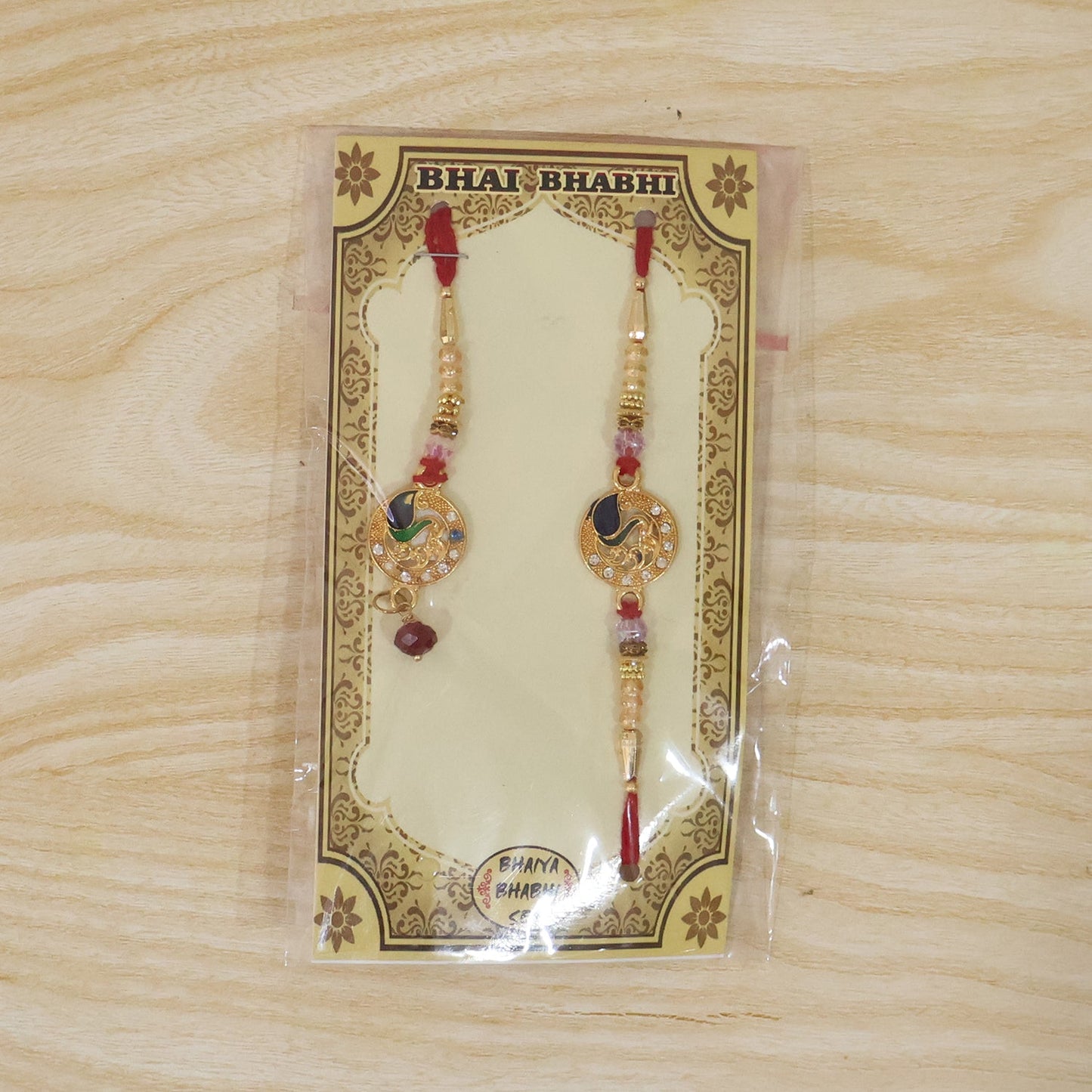 Peacock Stone Bhabhi Rakhi with Pearl Latkan full length view