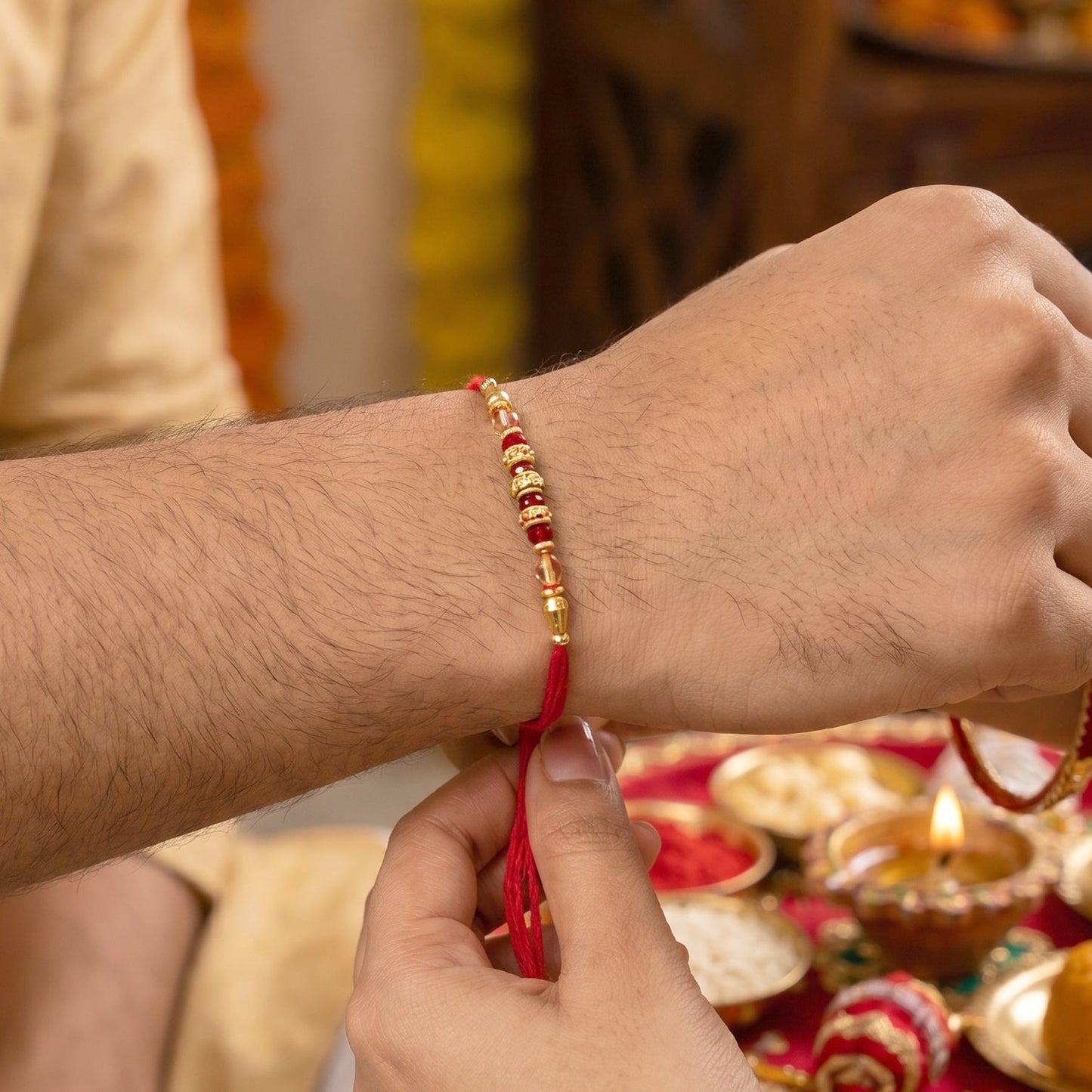 Peacock latkan Bhabhi Rakhi showing pearl beads