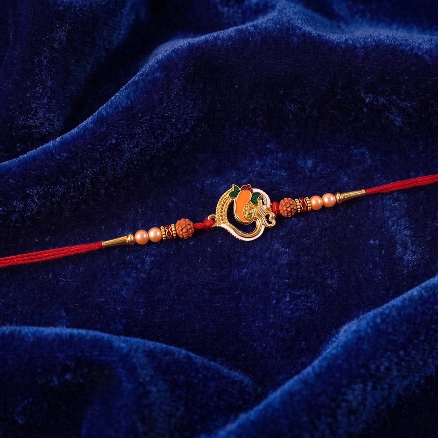 Full view of Ganesh Design Rakhi with Rudraksha beads