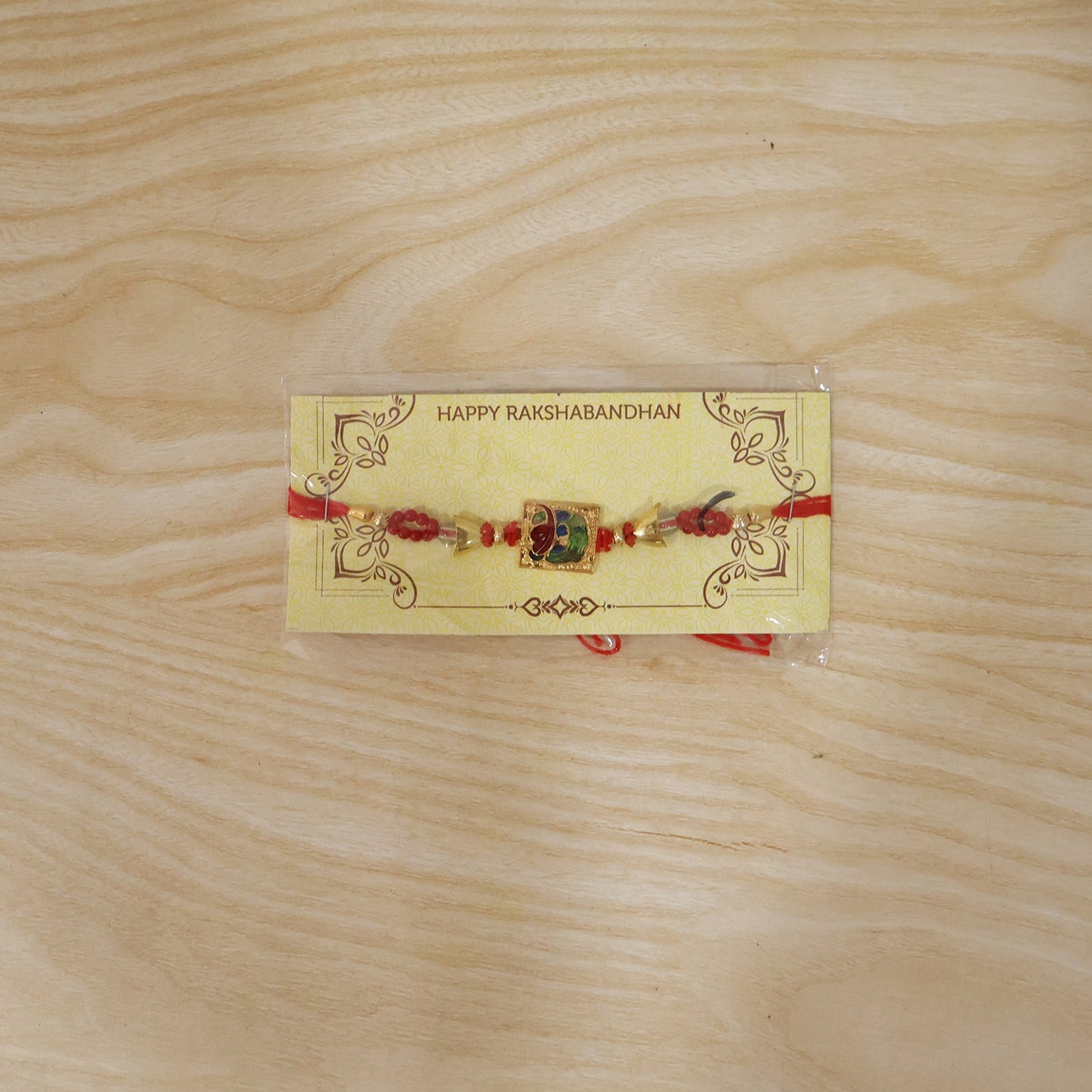 Traditional Square Motif Rakhi with Red Beads (1 Pc)