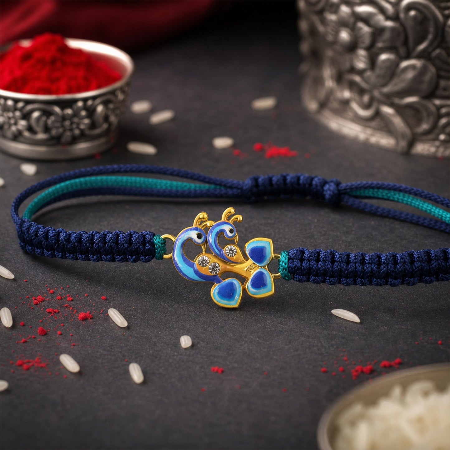 Close-up of peacock motif on Fancy Dori Rakhi