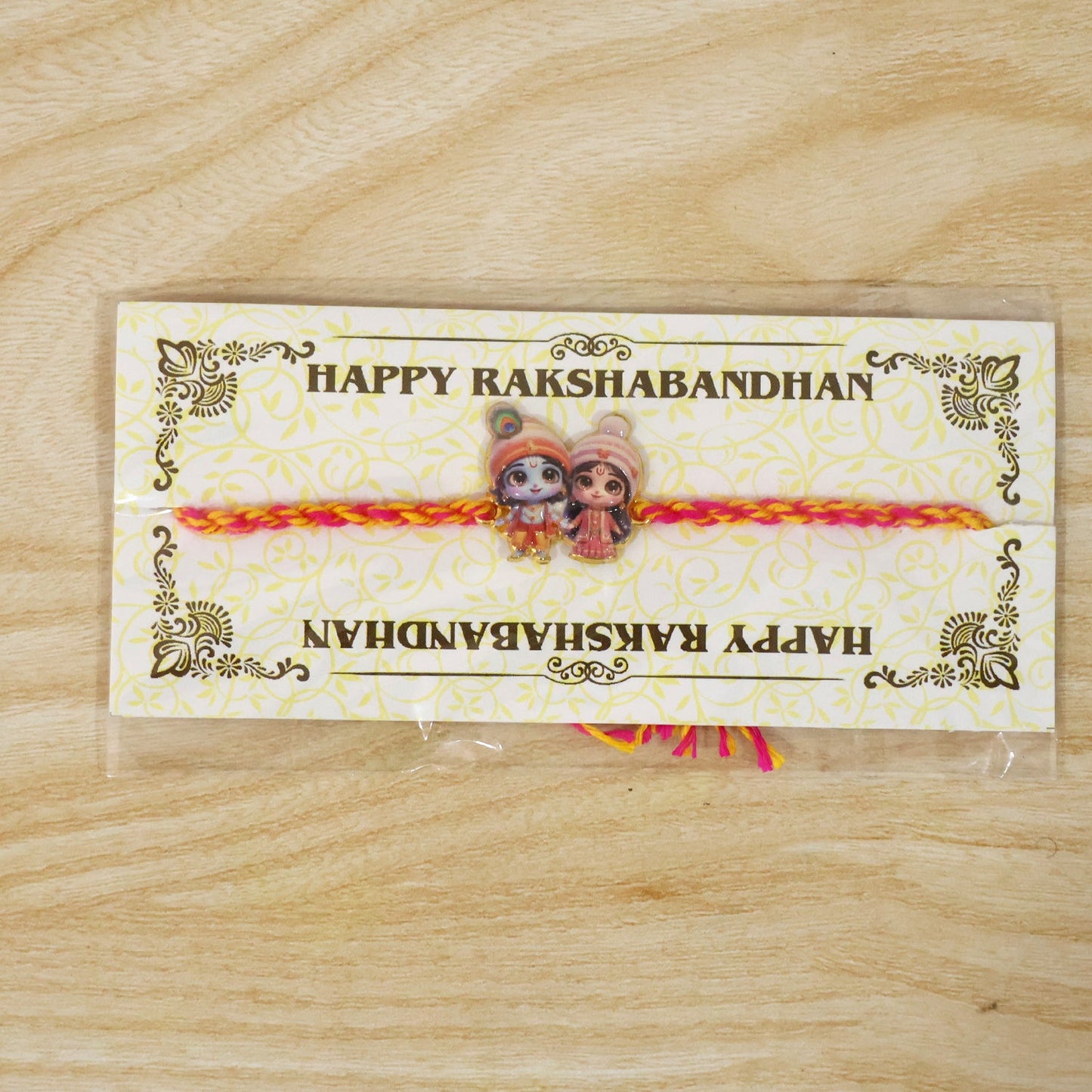 Neat finishing on Radha Krishna fancy dori rakhi