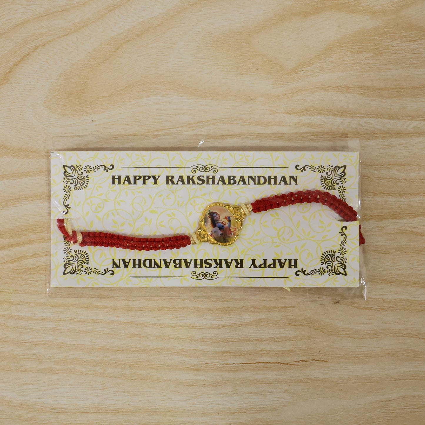 Festive Krishna Cow Charm Fancy Dori Rakhi detail