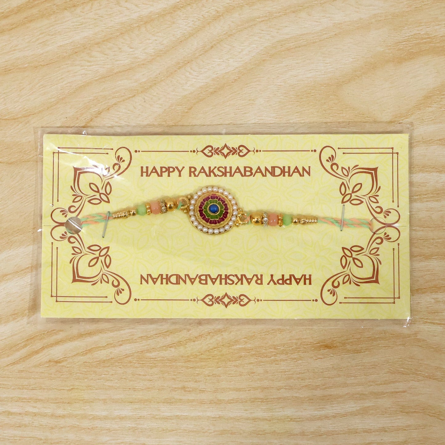Pearl floral rakhi tied with thread ready to gift