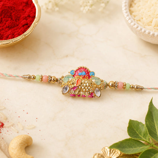Top view of colorful elephant bead rakhi with thread
