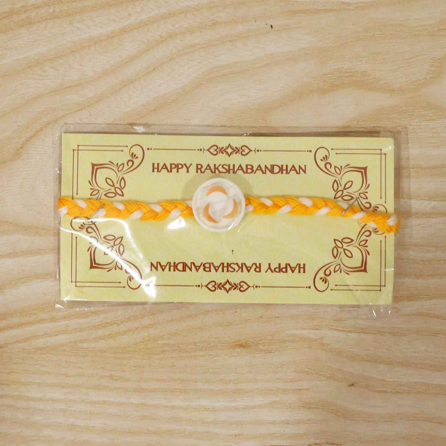 White Round Charm Fancy Dori Rakhi packaging