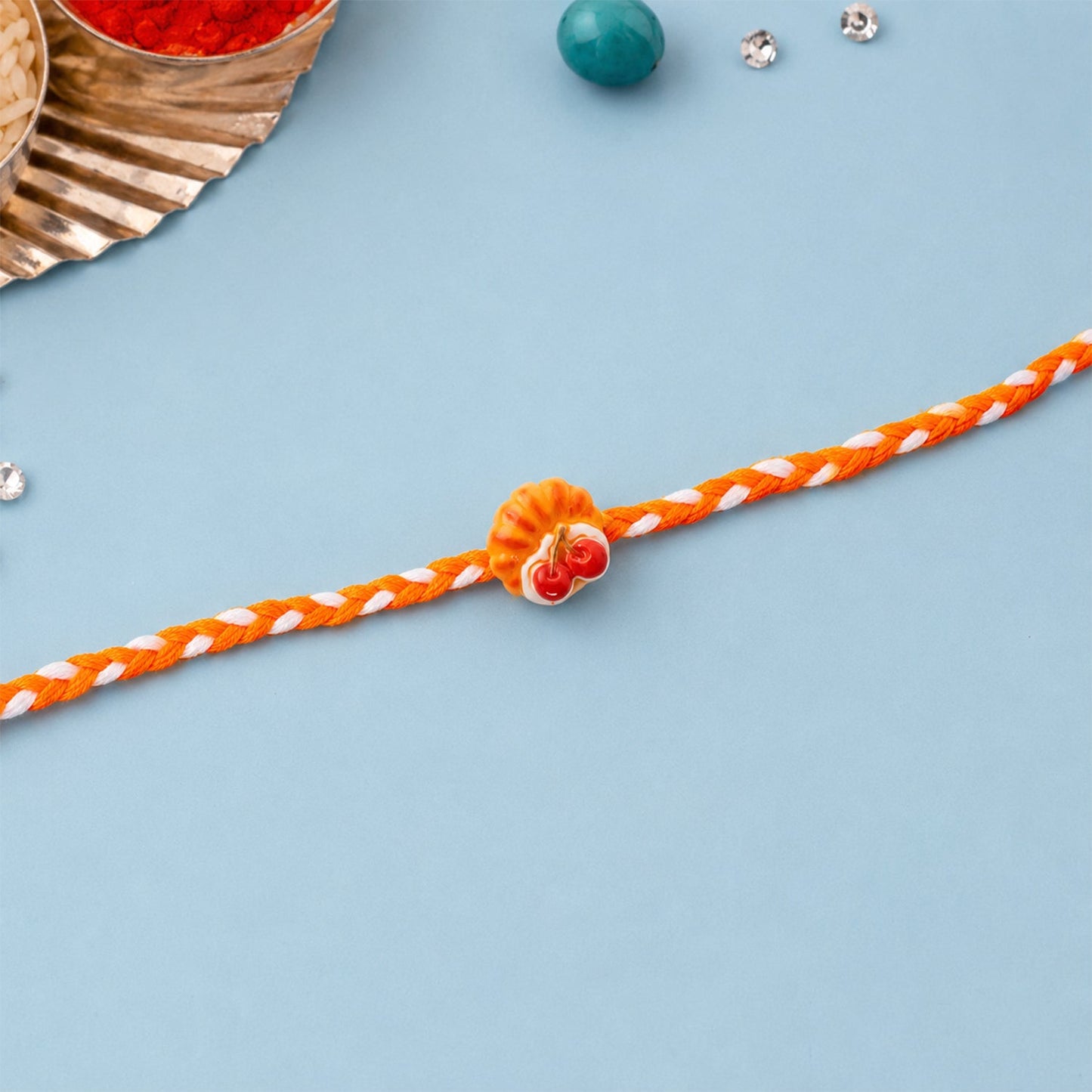Cherry Pastry Charm Fancy Dori Rakhi for Brother - Stylish & Lightweight