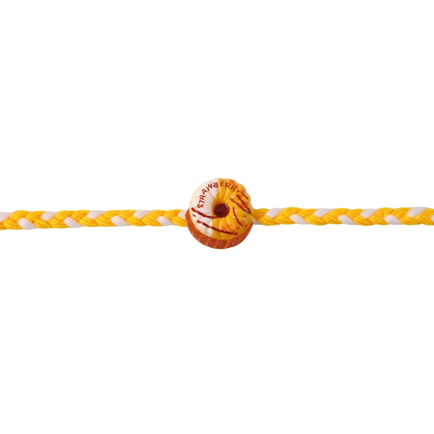 Donut charm rakhi on white background