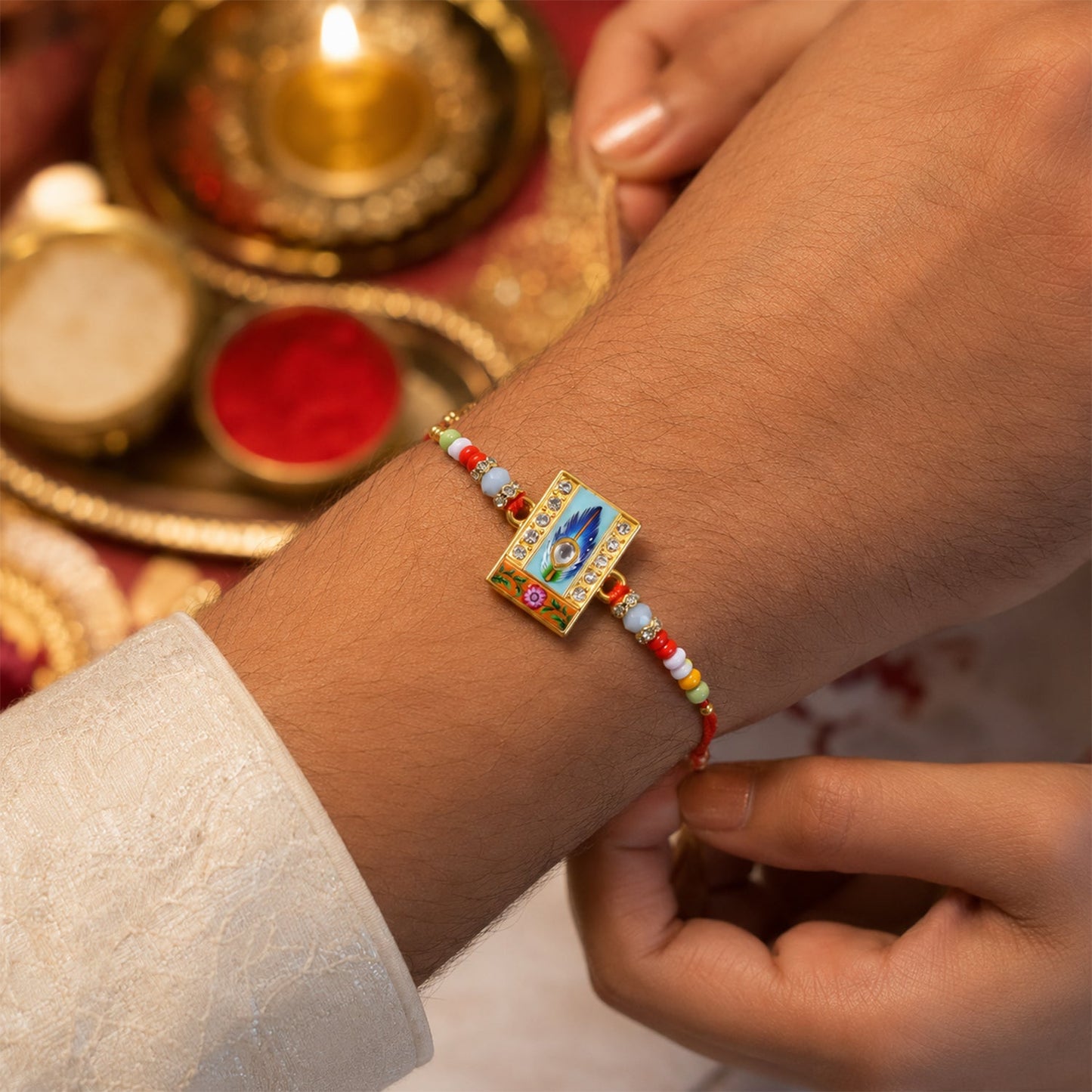 Designer Mor Pankh Square Kundan Rakhi with beads angled view