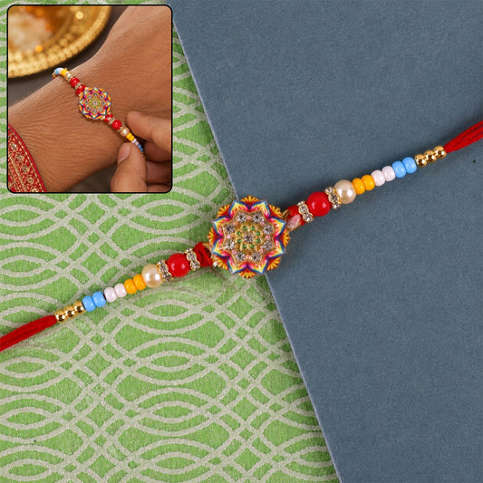 Rangoli Mandala Stone Charm Rakhi with pearl beads - front view