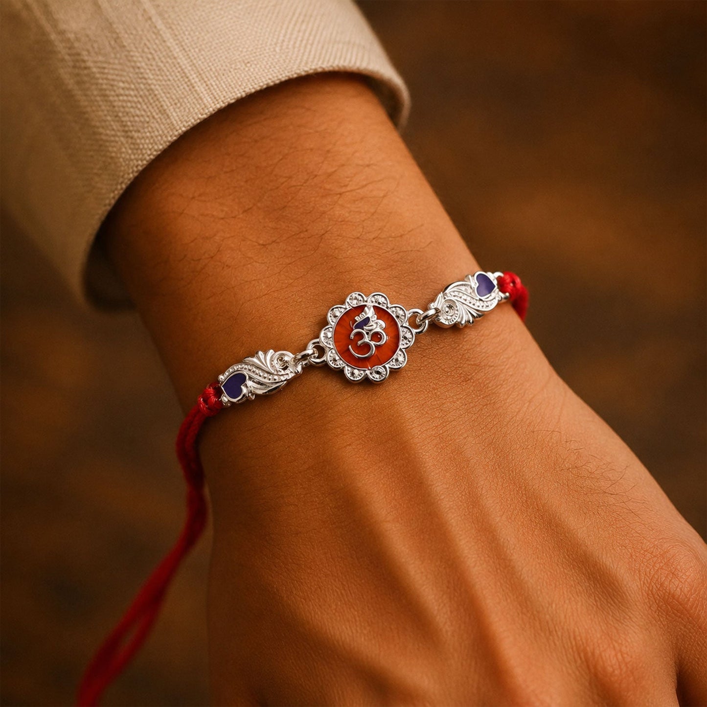 Silver Om Floral Charm With Dori Rakhi for Brother (1 Pc)