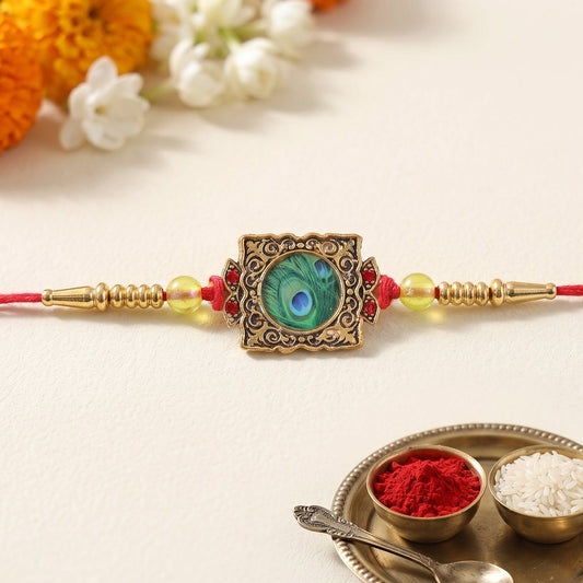 Antique Square Peacock Feather Rakhi
