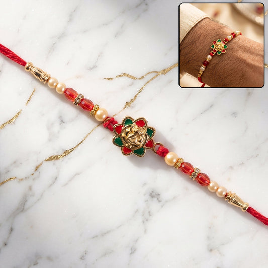 Traditional Golden Floral Meenakari Rakhi with Pearls & Red Beads for Brother - Rakshabandhan Gift