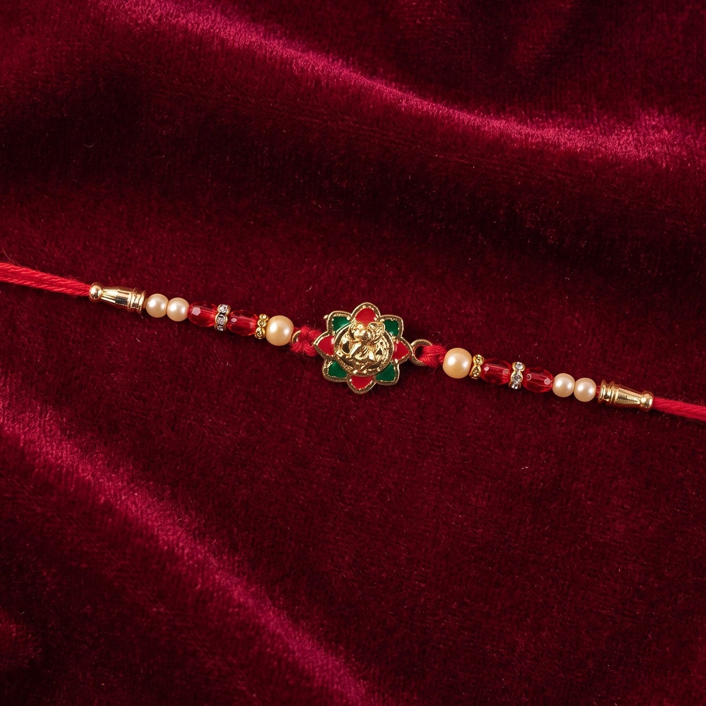 Traditional Golden Floral Meenakari Rakhi with Pearls & Red Beads for Brother - Rakshabandhan Gift