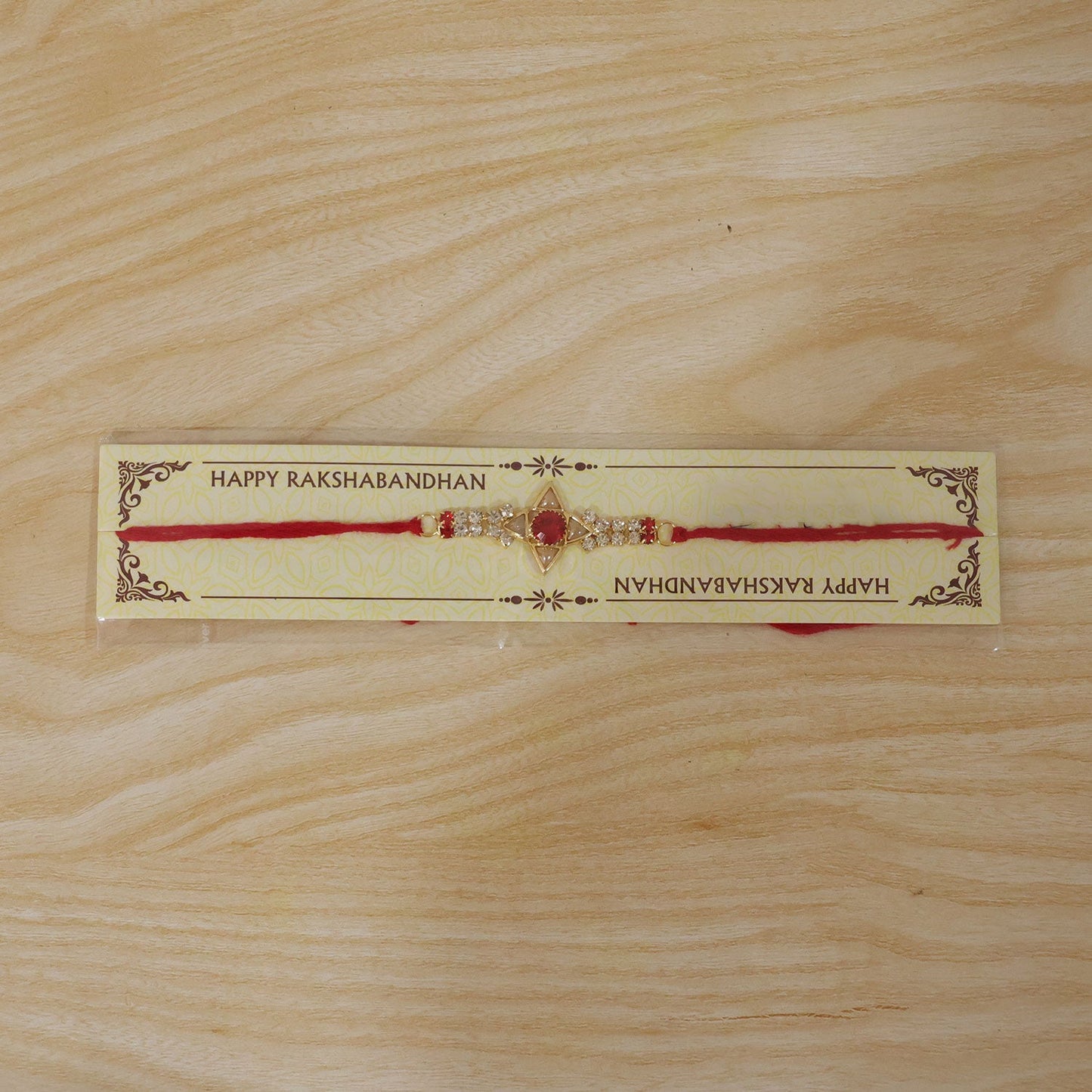 Sparkling Gold Star Rakhi with White & Red Stones for Brother - Raksha Bandhan Special