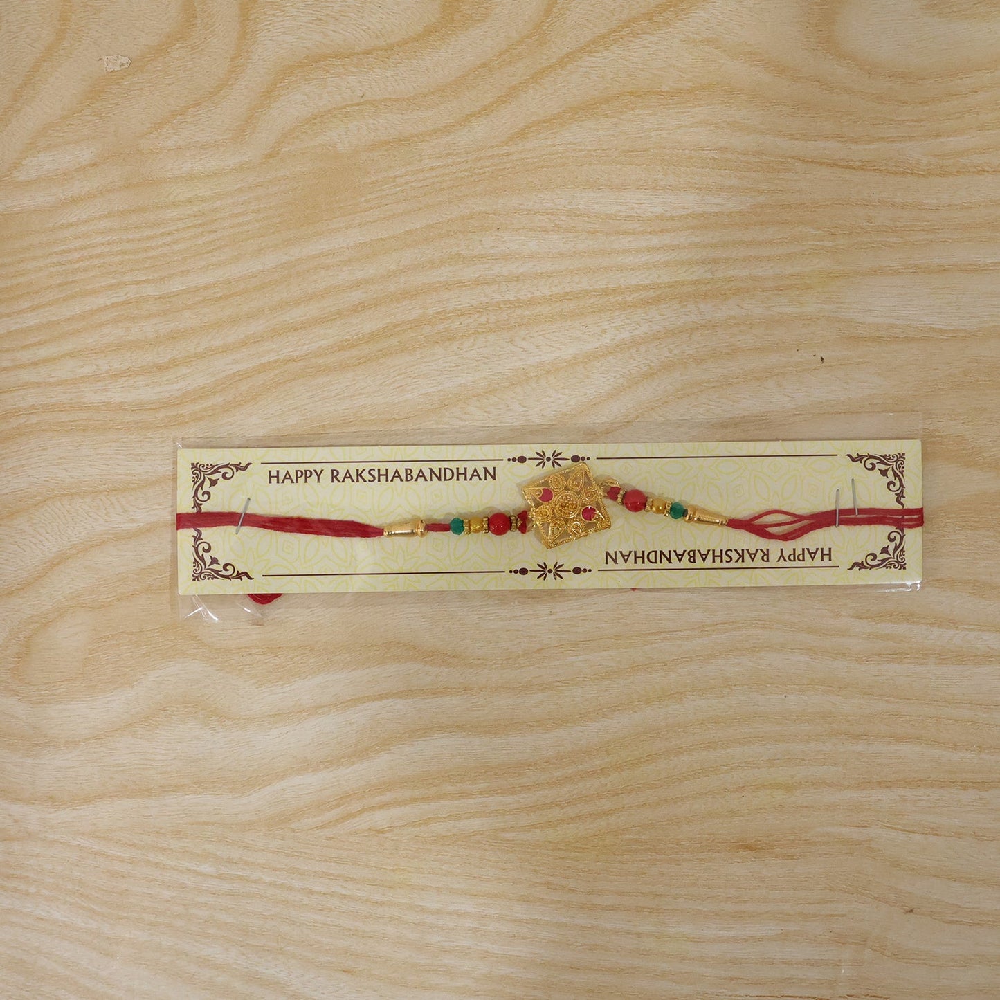 Golden Square Rakhi with Stone & Colourful Beads for Brother
