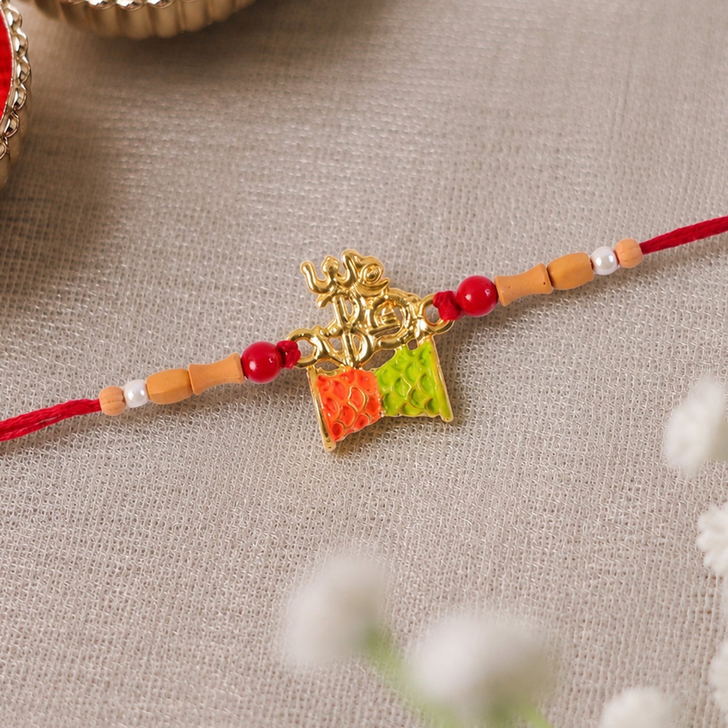 Fancy Golden Om Rakhi with Colourful Kite Charm for Brother - Kids Rakhi