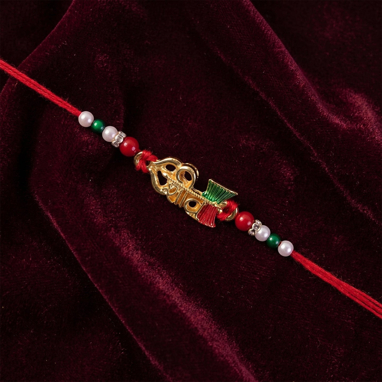 Elegant Golden Shiv Meenakari Rakhi with Beads for Brother