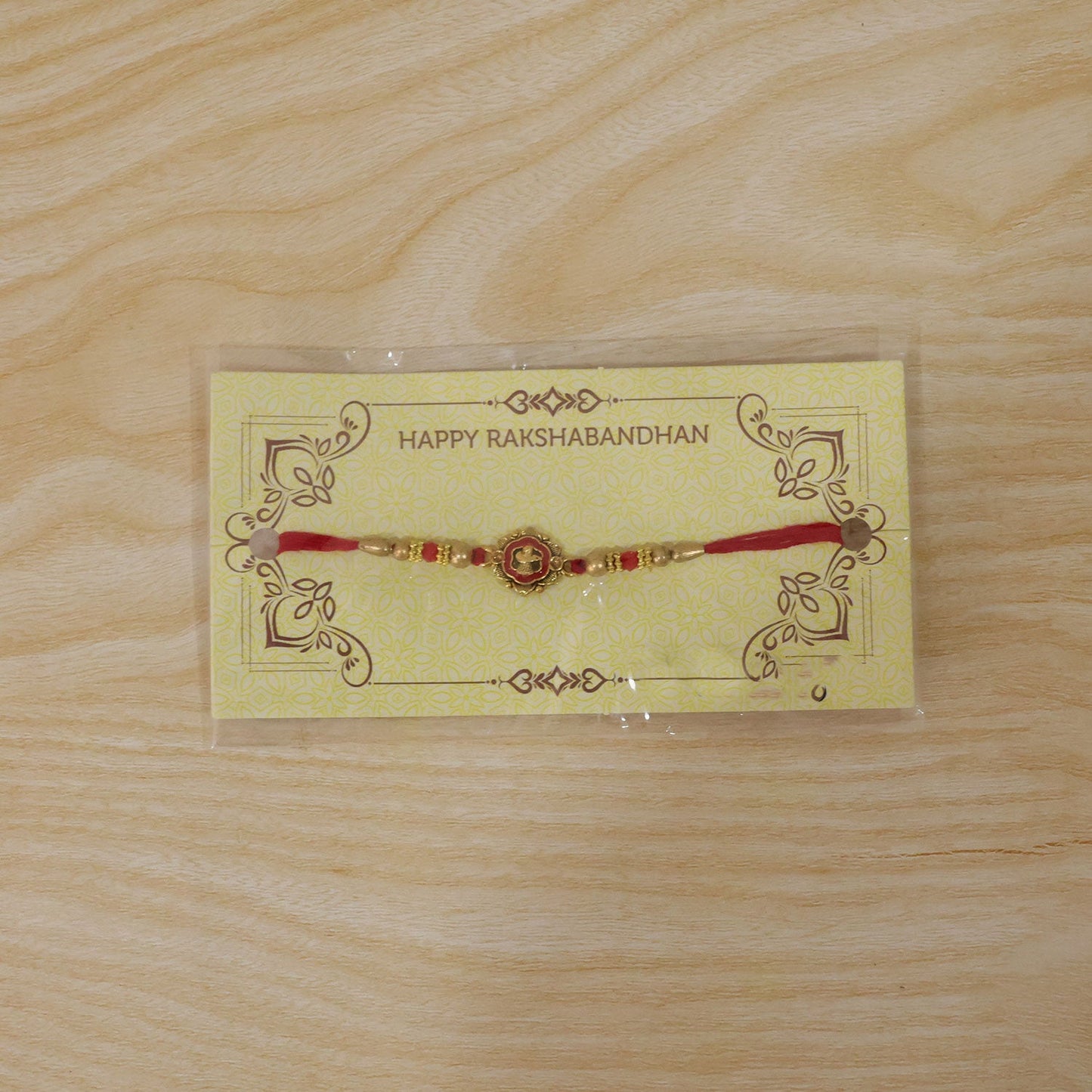 Golden Meenakari Floral Rakhi with Crystal Beads for Brother