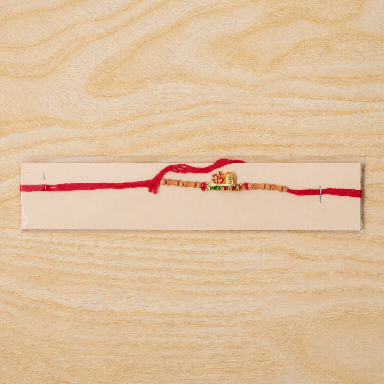 Simple Golden Om Rakhi with Beads for Brother - Raksha Bandhan Special