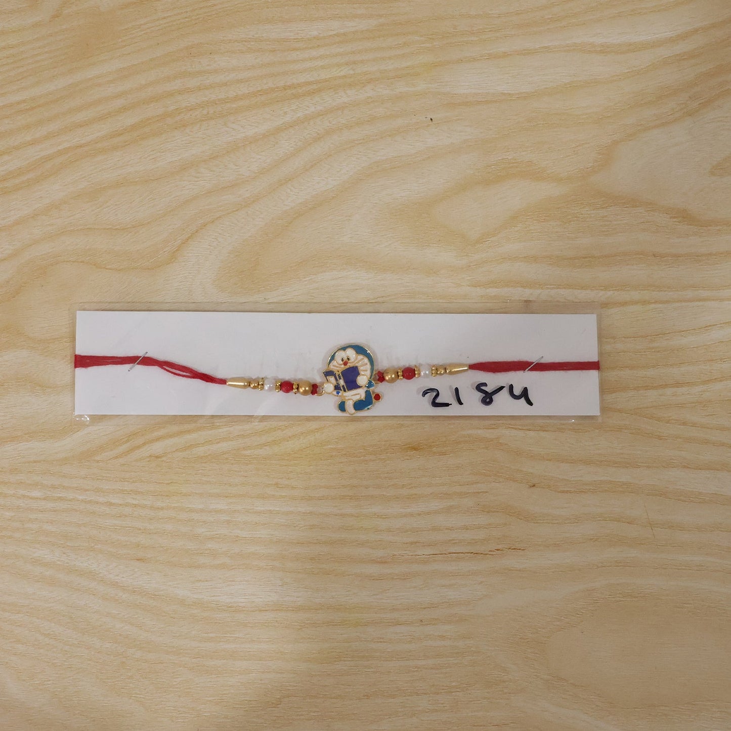 Doraemon Cartoon Kids Rakhi with Beads for Little Brother