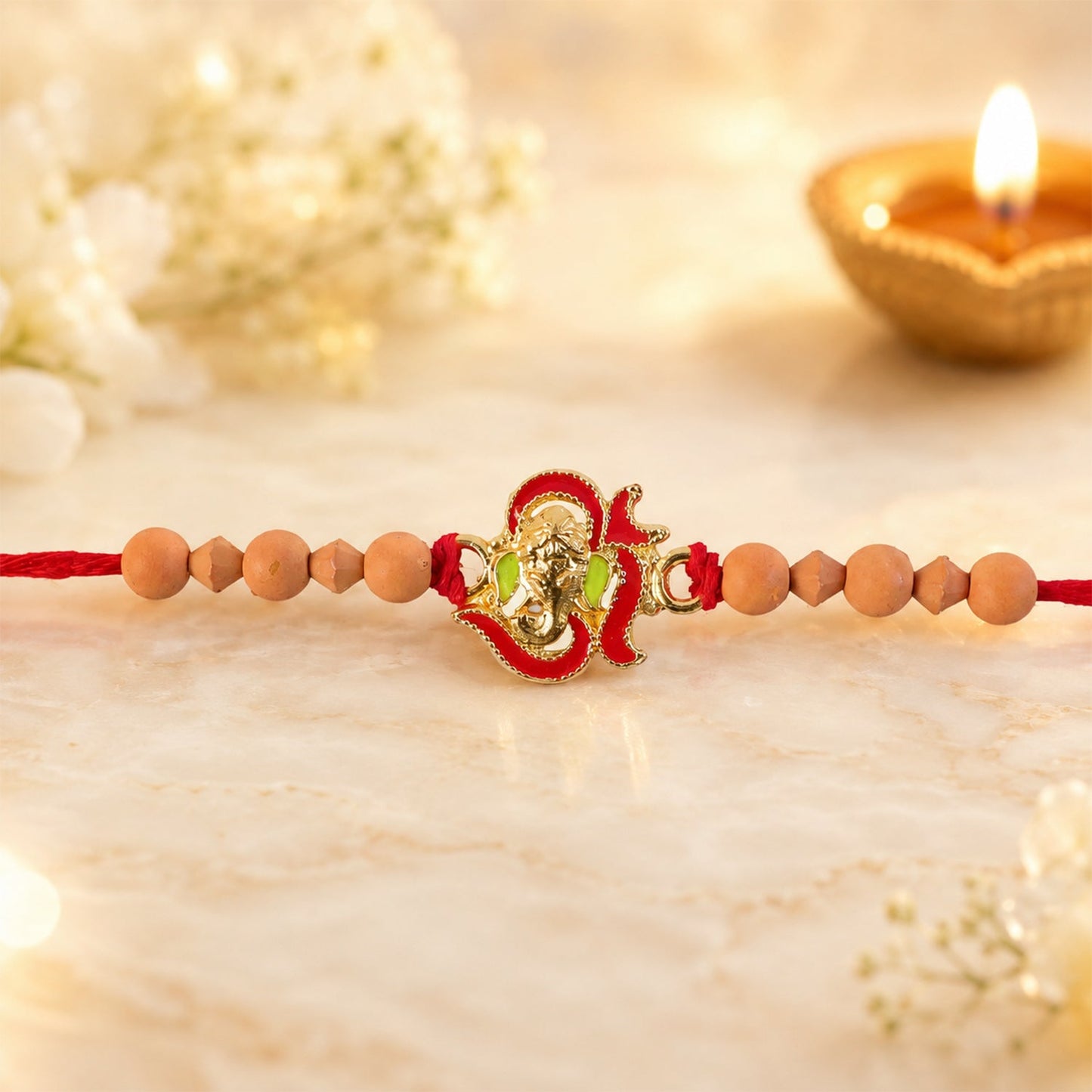 Lord Ganesha Sandalwood (Chandan) Bead Rakhi