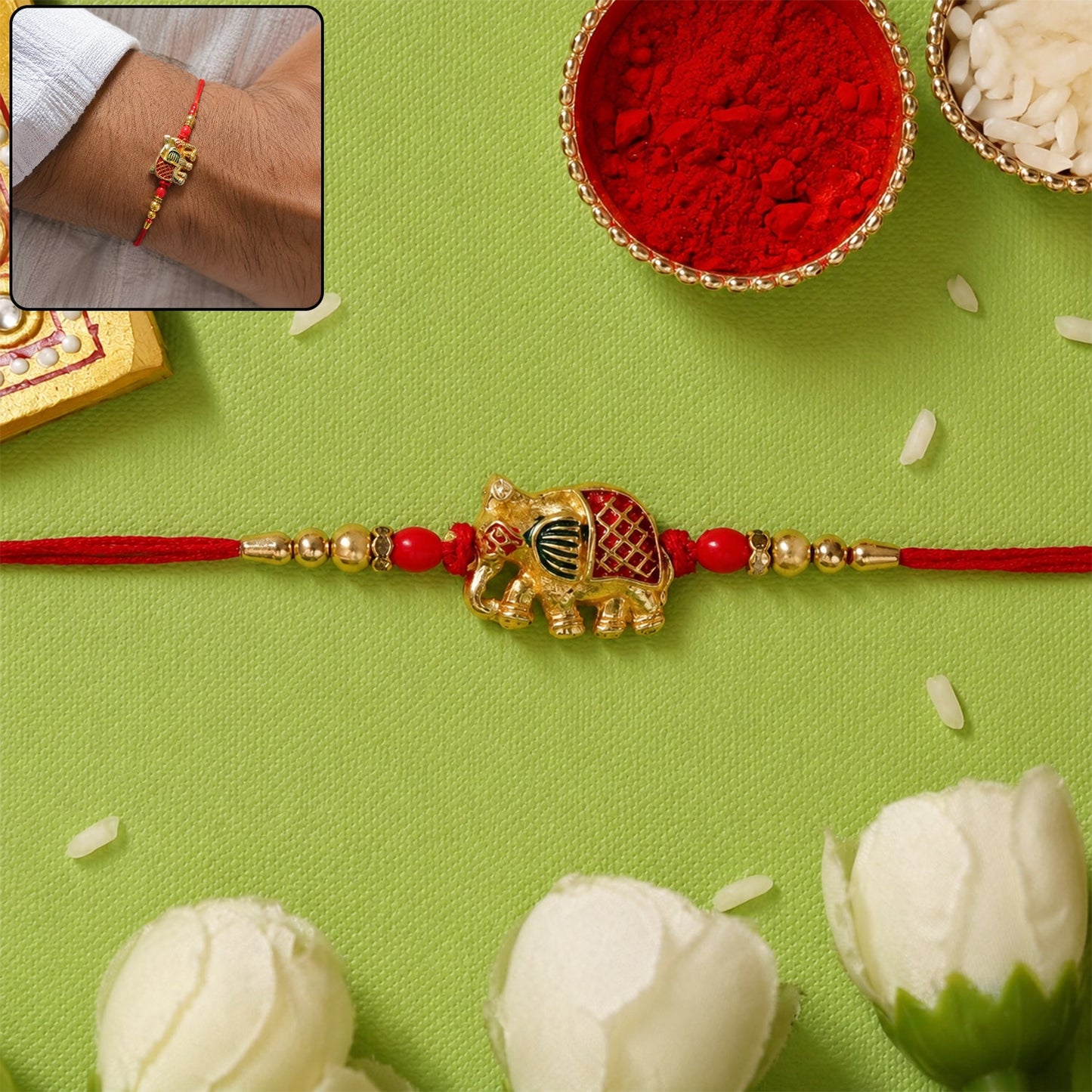 Gold Elephant Charm Rakhi with Red Thread and Beads Front View