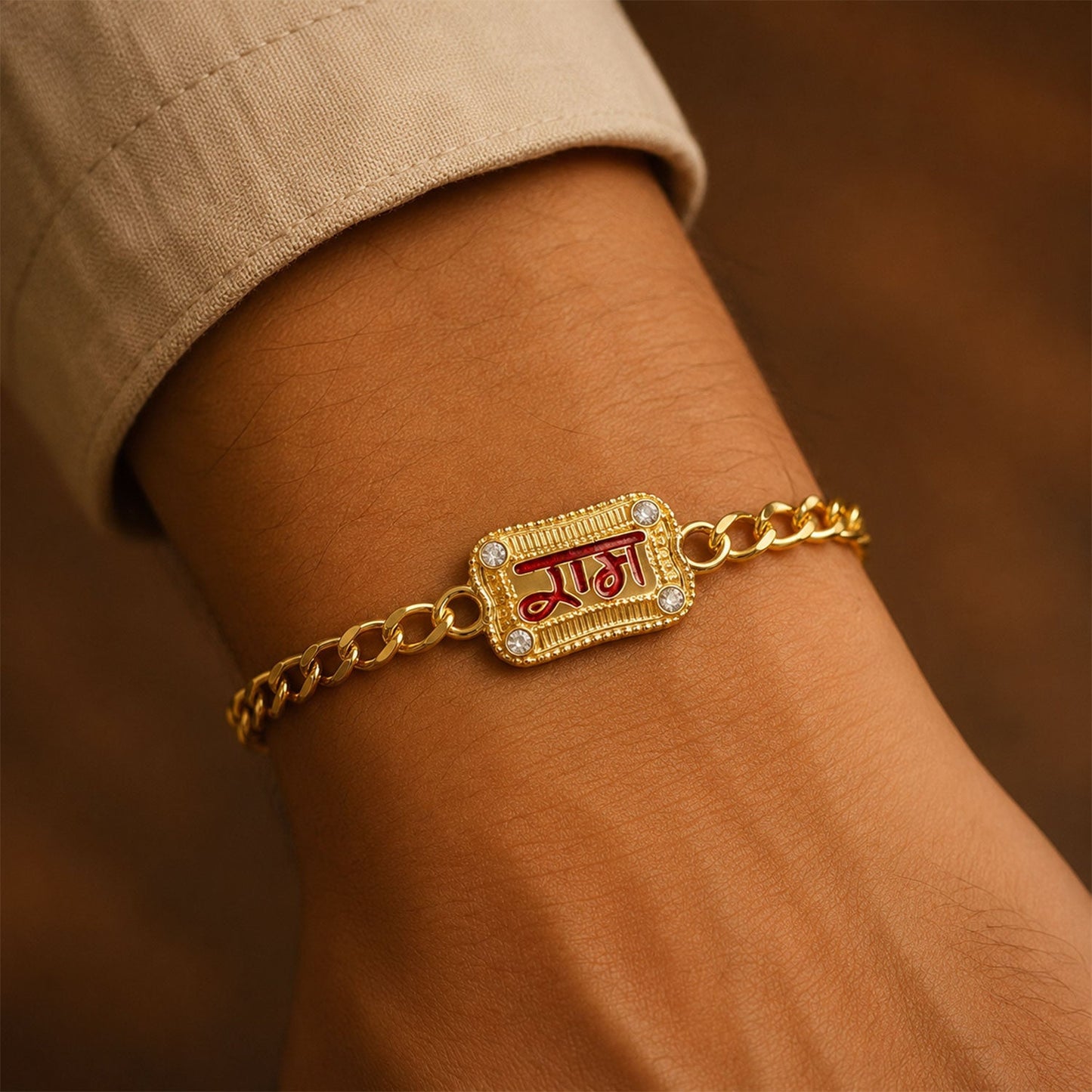 Ram Text Enamel Gold Tone Rakhi Bracelet close-up