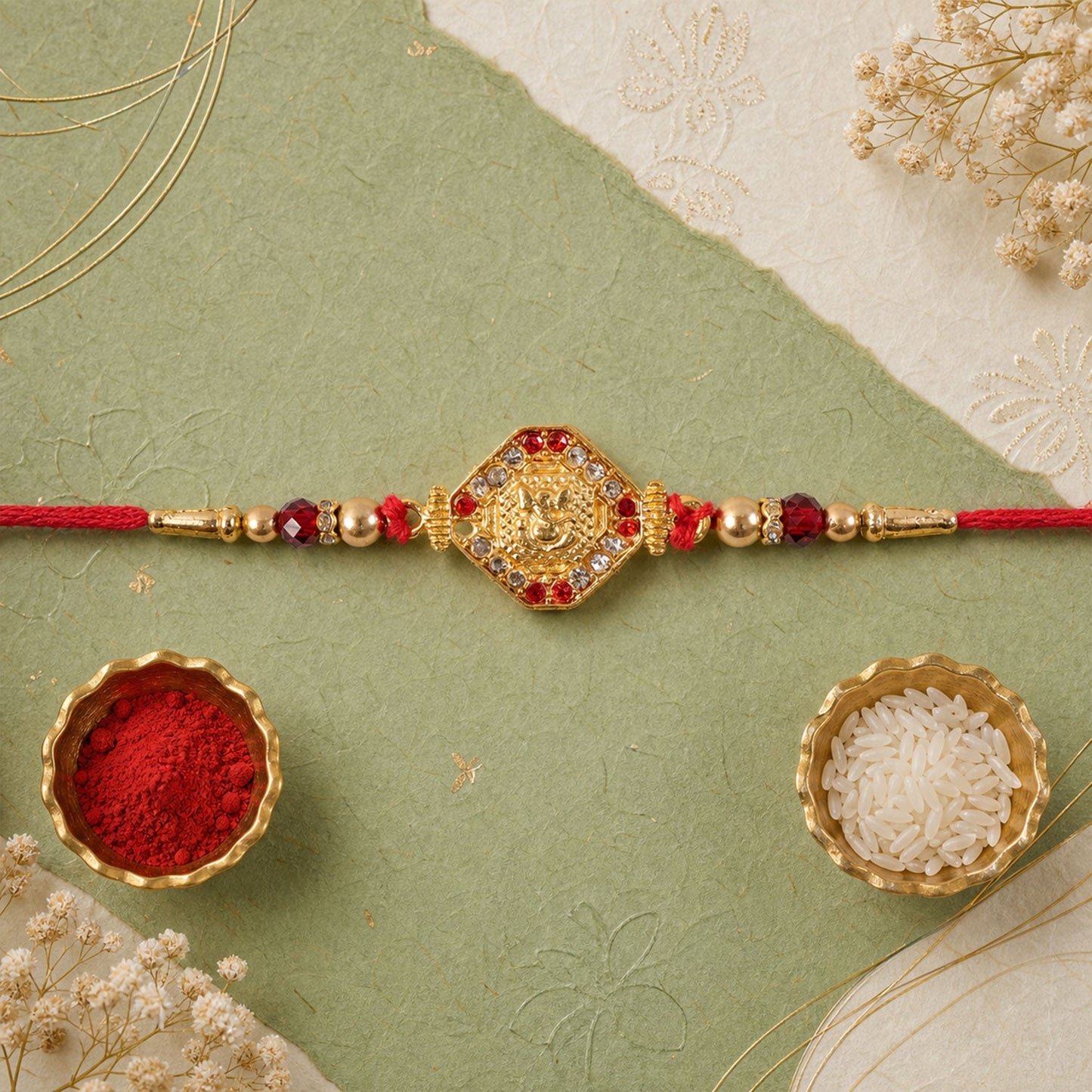 Lord Ganesha Red Enamel Gold Tone Rakhi