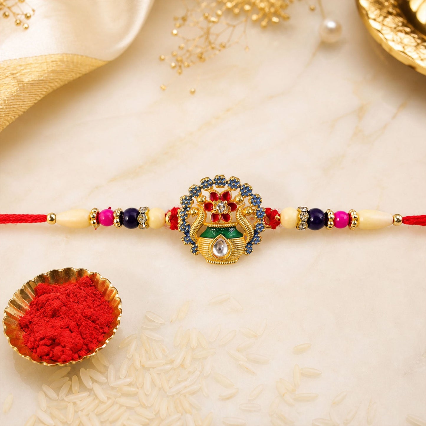 Angled view of festive Royal Kalash Rakhi