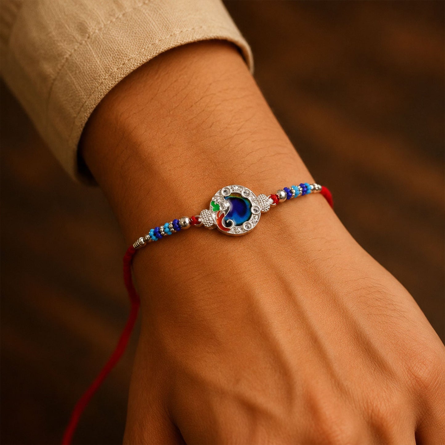 Peacock Blue Stone Silver Tone Rakhi