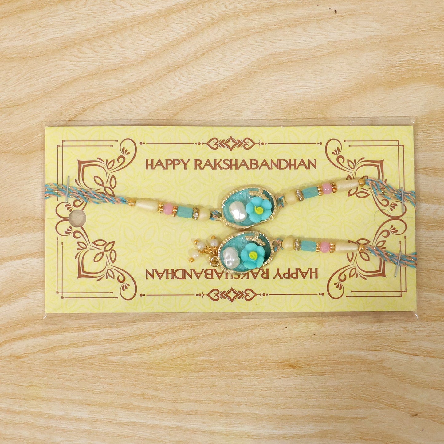 Aqua Floral Bhaiya Bhabhi Lumba Rakhi with Pearl