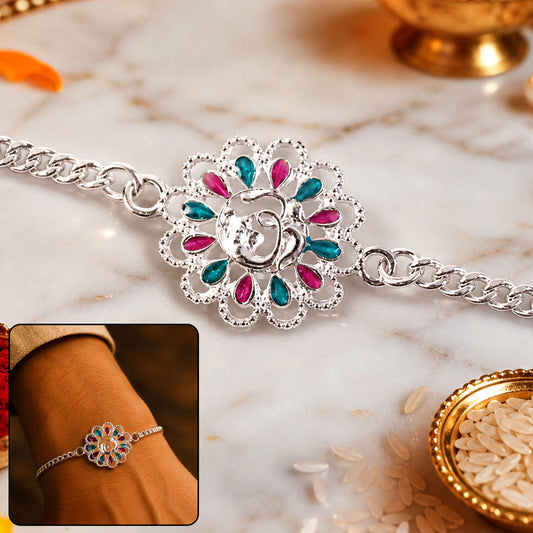 Close-up of Silver floral Om enamel chain bracelet for Rakhi