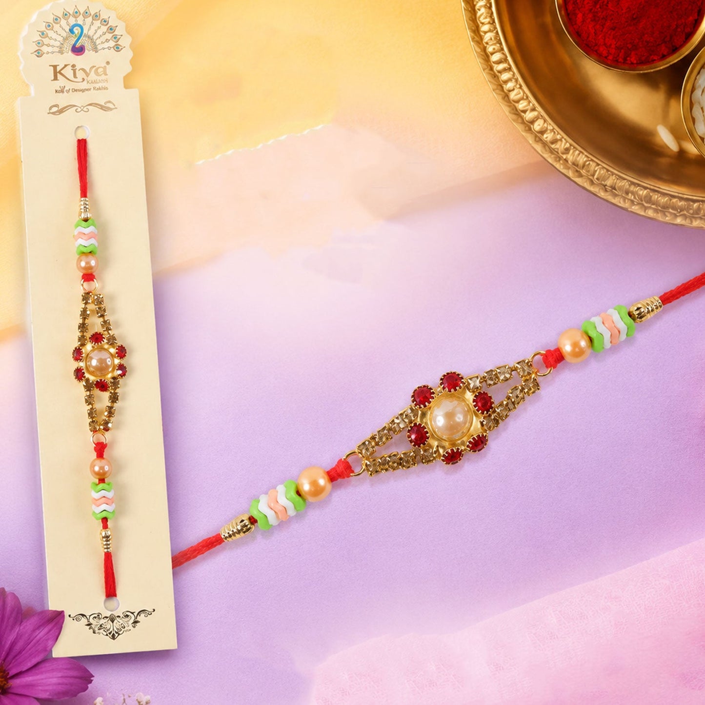 Pearl stone designer rakhi for brother with decorative beads on a festive background.