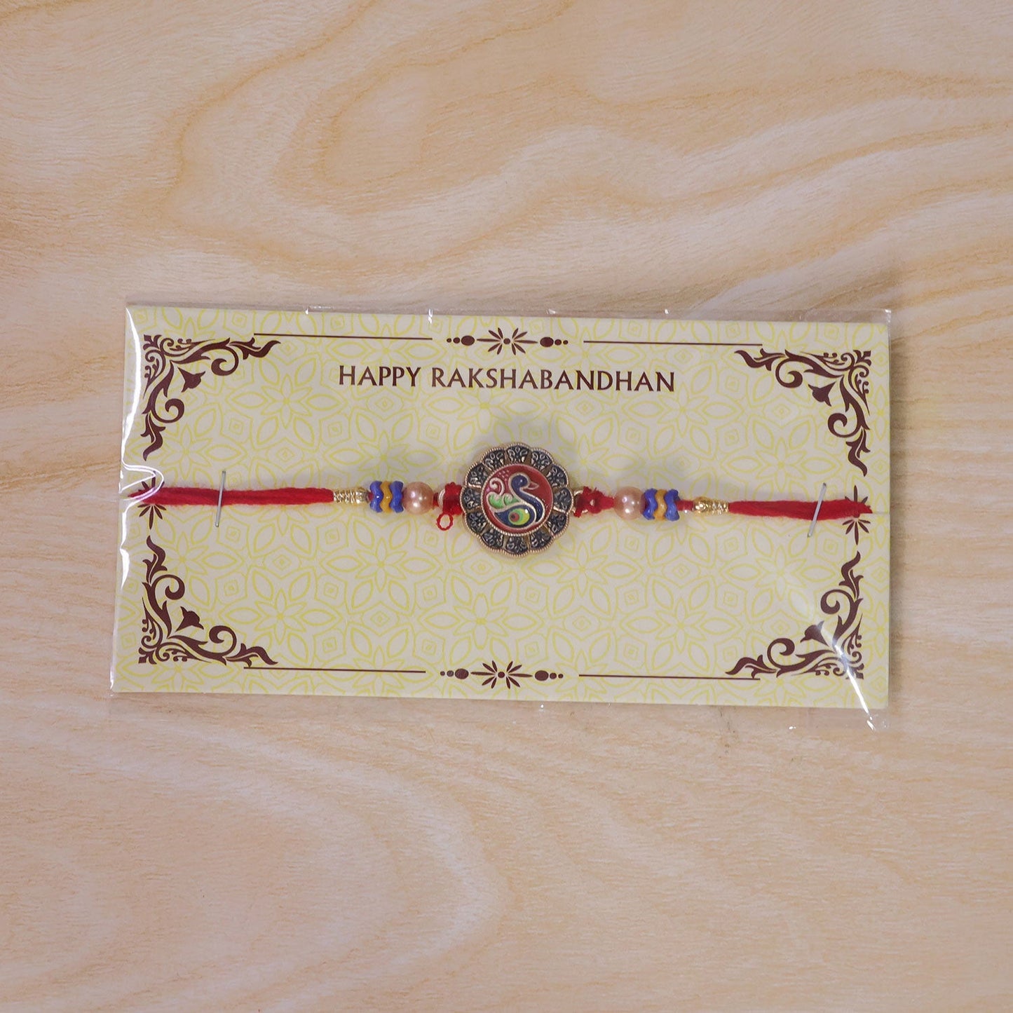 Traditional Peacock Motif Pearl Beads Designer Rakhi For Brother