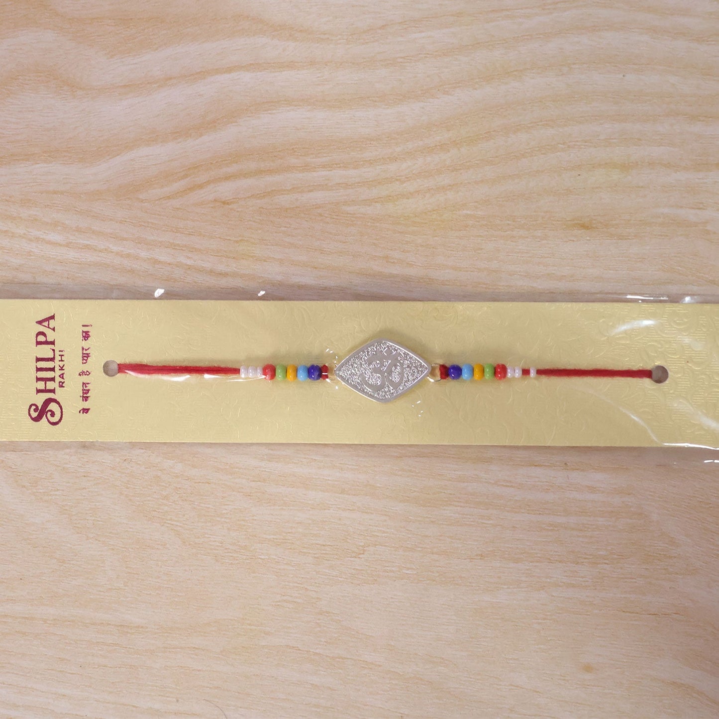 Om Symbol Beaded Designer Premium Traditional Rakhi for Brother