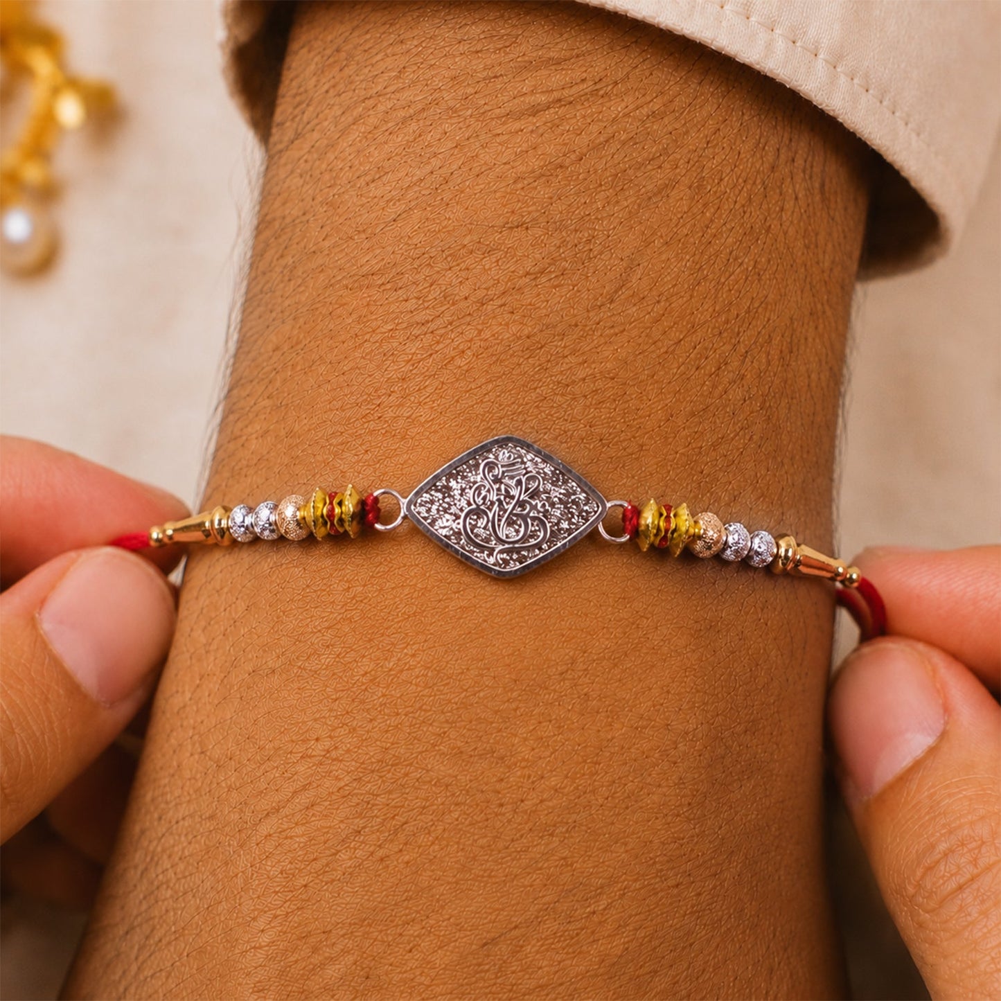 Ganesha Charm Studded Designer Rakhi for Brother