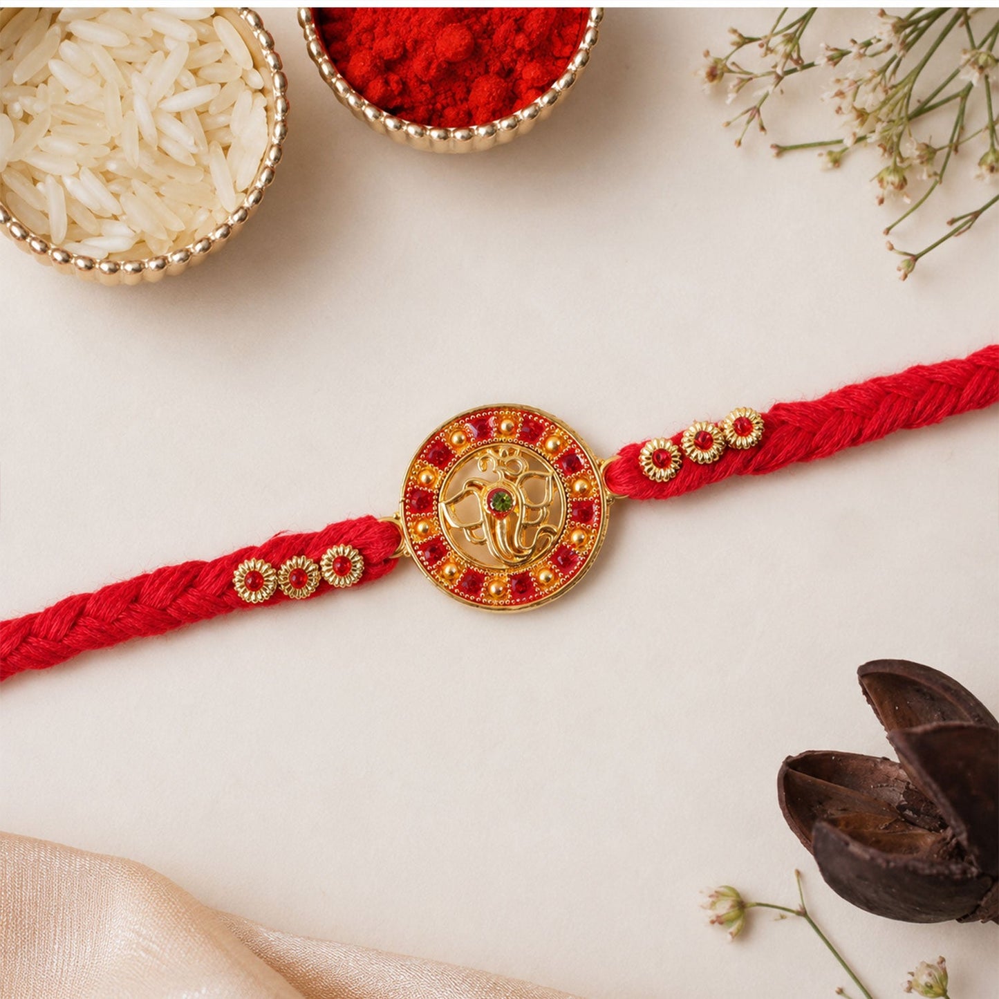 Divine Ganesha Round Rakhi with Stone Studded Border Rakhi for Brother