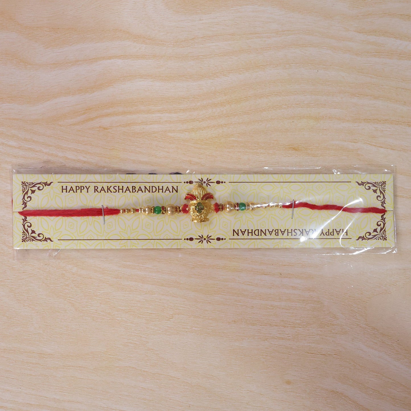 Traditional Golden Kalash Motif Rakhi with Beadwork Rakhi for Brother