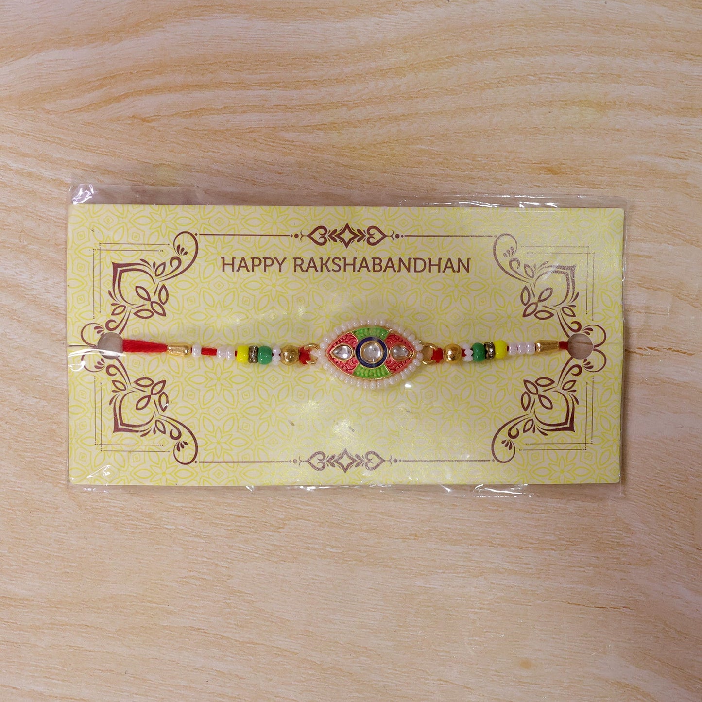 Designer Kundan Meenakari Rakhi with Pearl Border – Rakhi for Brother