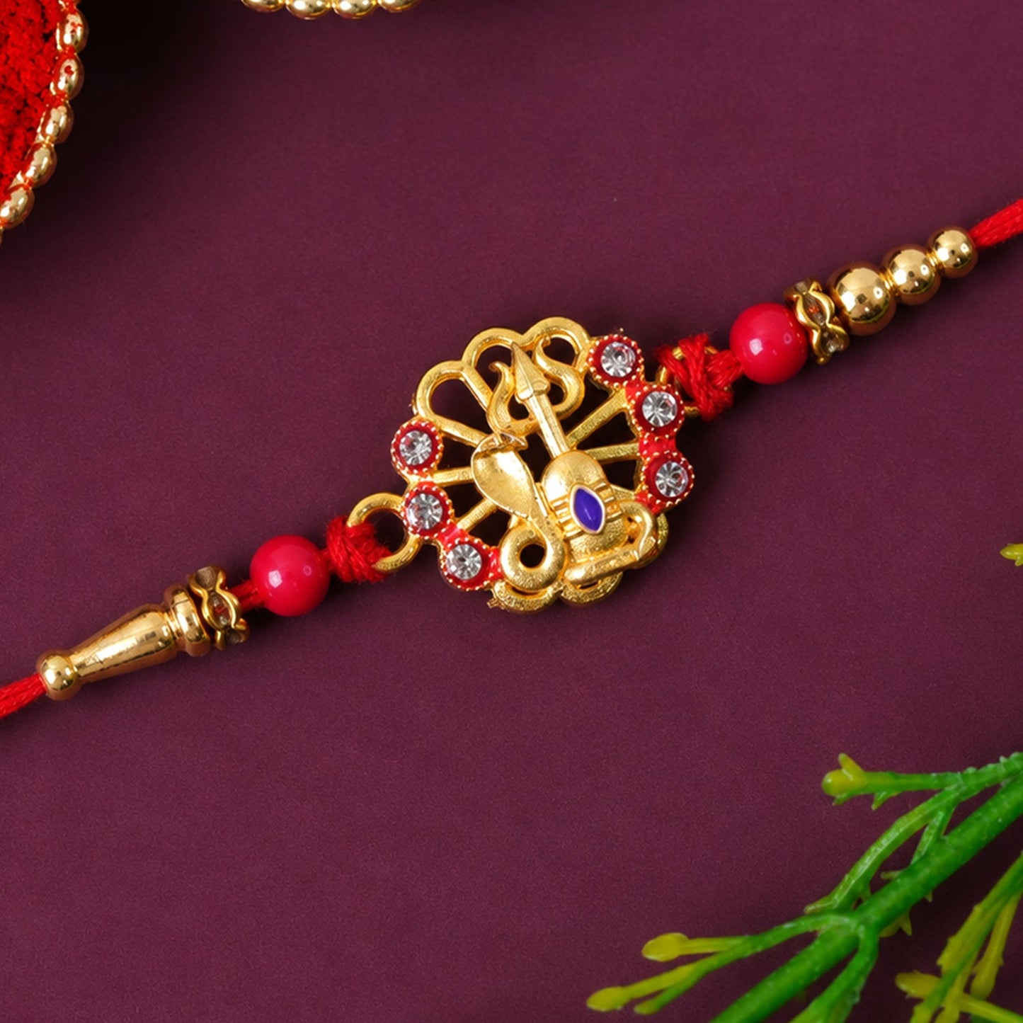 Divine Shiv Trishul Rakhi with Crystal Stones Rakhi for Brother