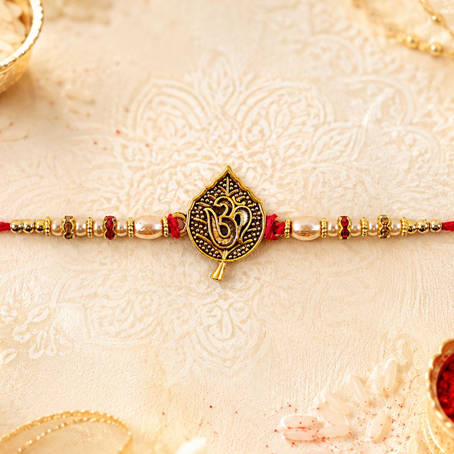 Leaf Shape Om Motif Premium Beaded Designer Rakhi for Brother