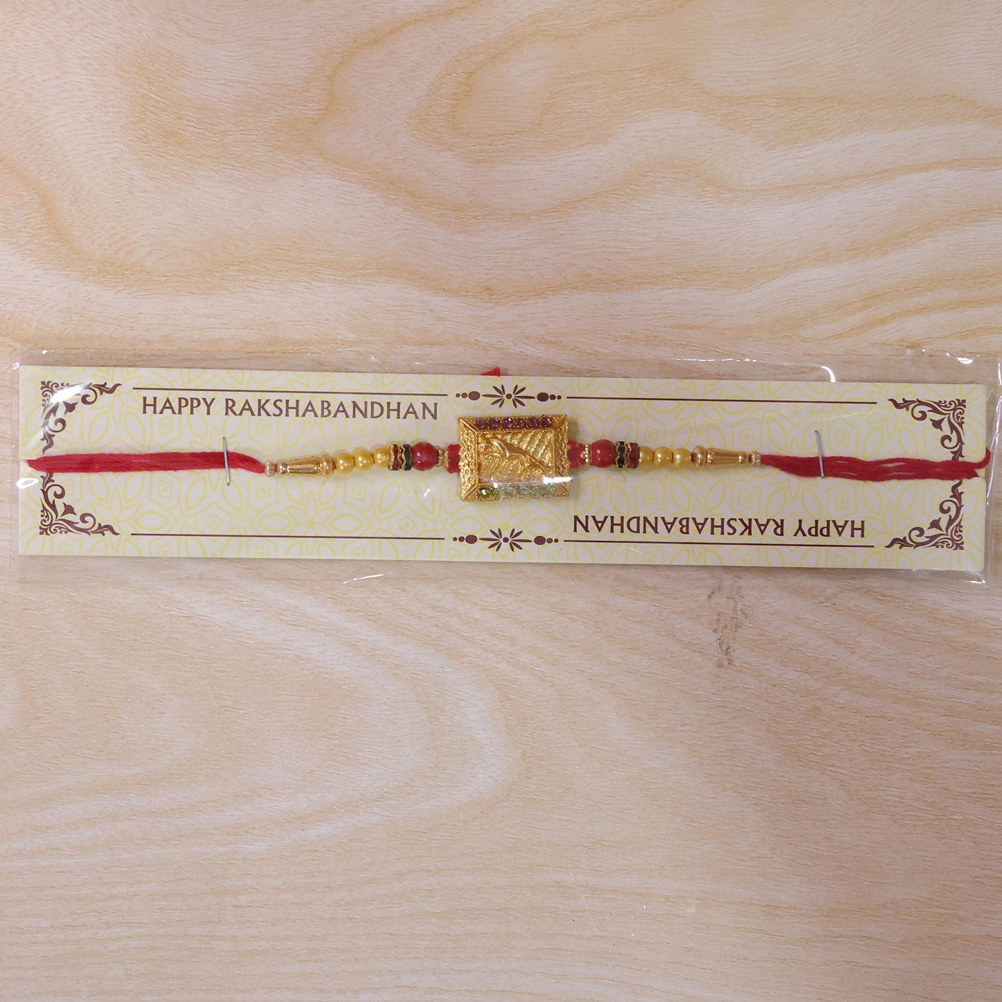 Traditional Golden Rectangle Rakhi with Stone Detail Rakhi for Brother