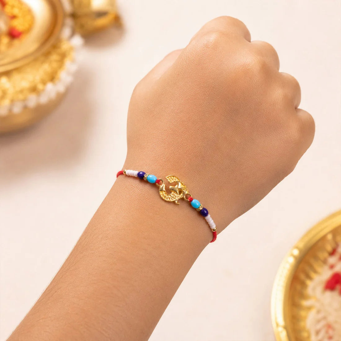 Om Symbol Beaded Rakhi for Brother - Traditional Design