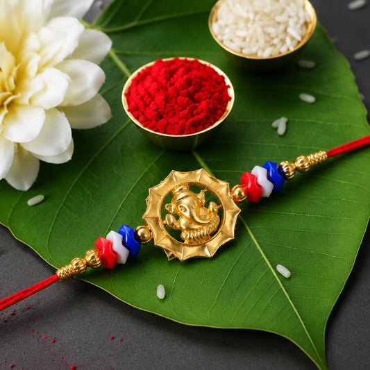 Ganesha Motif Rakhi with vibrant stone embellishments for Raksha Bandhan.