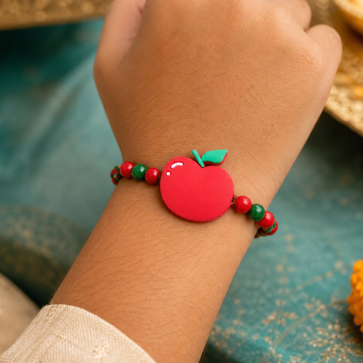Apple Charm Kids Rakhi with Beads for Raksha Bandhan Special