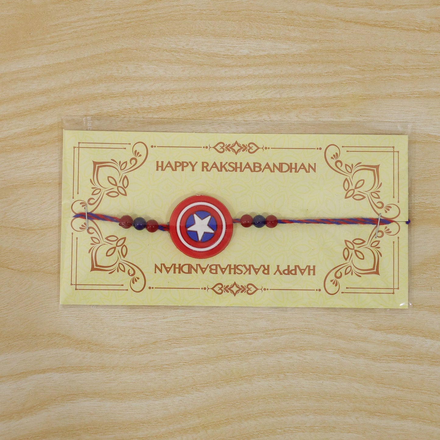 Superhero Shield Kids Rakhi with Playful Beaded Detailing Work